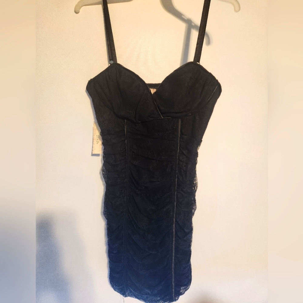 Large, black spaghetti strap dress, lace material. Brand new, never worn.